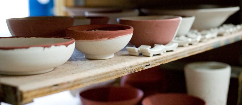 ceramic bowls on shelf